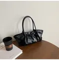 Elegante borsa a mano in ecopelle intrecciata nera con fiocco e dettagli a pieghe - Nero