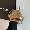 Minimalist golden shell bag with metallic pleated leather and thin shoulder strap - Gold