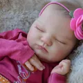 Lebensechte 19-Zoll Reborn-Babypuppe schlafend mit rosa Blumenstirnband und Baumwollkleidung - Stoffkörper Stil / 49cm