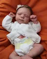 Close-up of lifelike newborn reborn doll features sleeping pose and knitted sweater - Full Silicone Body Style (FBBD-020)