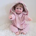 50cm realistic Reborn Doll Maddie in pink bunny hooded romper on plush rug - Full Vinyl Girl Style (Maddie) / Pink / 50 cm