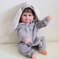 Lifelike 50cm reborn baby doll Maddie wearing a grey long-eared rabbit romper suit - Realistic Baby Girl Style (Small 18-2 Full Vinyl) / 50cm / Gray