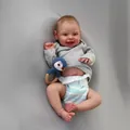 Realistic 50cm reborn baby doll in grey hoodie with crochet penguin toy and wooden ring - Realistic Smiling Style (3004) / 50 cm