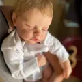 Realistic 18 inch sleeping Reborn baby doll with lifelike skin texture and white romper - Sleeping Closed Eyes Style / 18 inch