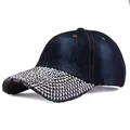 Detail of dark blue denim baseball cap with silver rhinestones on the brim and contrast stitching - Adjustable / Dark Denim Blue