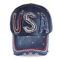 Macro detail of USA crystal rhinestones and sequins on navy blue denim baseball cap - Dark Blue Denim