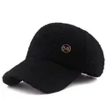 Women's black faux shearling baseball cap with golden M logo for winter warmth - Adjustable / Black No Pom Pom