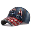Detailed close-up of USA rhinestone letters and silver stars on blue denim baseball cap - Adjustable / Dark Blue Denim (No. 3)