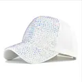 Close-up of sparkling colorful rhinestones on a white baseball cap for women - Adjustable / White AB Rhinestones