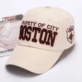 Detailed close-up of beige cotton baseball cap with red BOSTON 3D letter embroidery - Khaki
