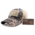 Macro detail of breathable mesh fabric and tactical USA flag patch on camouflage cap - Adjustable / Gray
