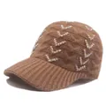 Close-up of knit baseball cap showing brown cable texture and V-shaped rhinestone patterns - Adjustable / Coffee