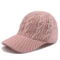 Close-up of pink cable knit baseball hat featuring wavy rows of colorful rhinestones - Adjustable / Pink