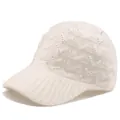 Detailed view of cable knit baseball cap with sparkling AB rhinestones on white fabric - Adjustable / White