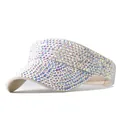 Detailweergave van de glinsterende strassteentjes op een stijlvolle zonneklep - Beige Hoed met Witte AB Strass