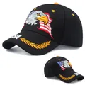 Black baseball cap featuring eagle and USA flag embroidery with yellow laurel leaf details - Eagle USA Black