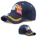 Navy blue baseball cap featuring eagle and USA flag embroidery with golden leaf brim - Eagle USA Navy Blue