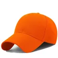 Detail of the bright orange cotton baseball cap with classic curved brim and six panels - Adjustable / Orange