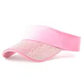 Detail of pink visor cap with sparkling rhinestones on the brim and cotton twill fabric - Plain Solid Pink