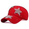 Vibrant red baseball cap featuring silver star-shaped metal studs and curved brim - Adjustable / Red