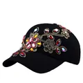 Black cotton baseball cap with gold floral embroidery and colorful rhinestones - Adjustable / Black