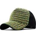 Detailed view of women's black baseball cap with dense gold and AB crystal rhinestones - Black Hat with Green Rhinestones