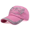 Detailed view of pink cotton baseball cap with glittering rhinestone wings and brim - Pink