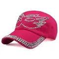 Detailed close-up of rose red baseball cap with silver rhinestone wing design and trim - Rose Red