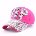 Detail of rose red cotton baseball cap with VIP rhinestone lettering and sparkling brim - Clear Rhinestone Rose Red