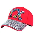 Red cotton baseball cap featuring colorful rhinestone TX letter and diamond-encrusted brim - One Size / Red