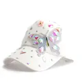Close-up of white baseball cap with colorful rhinestone butterfly and 3D floral accent - Adjustable / White
