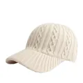 Chic cream white knitted baseball cap featuring elegant cable knit textures for women - Beige