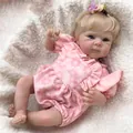 Lifelike 18-inch reborn baby doll with blonde curly hair and pink floral outfit - Pink Floral Romper Style