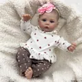 Realistic 46cm reborn baby doll Meadow wearing heart print outfit and floral headband - Cloth Body Style / Pink and White Heart Style / 46cm
