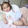 Realistic 60cm Charlotte reborn baby doll in white lace dress with brown curly hair pigtails - 60 cm