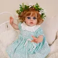 12-inch fairy reborn baby doll with curly hair and floral crown in woven bassinet - 30cm Cloth Body / Blue