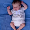 Bambola reborn realistica da 19 pollici neonato dormiente in abito bianco a maglia e pizzo - Stile Corpo in Tessuto / Specifica Standard
