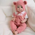 19-inch realistic reborn baby doll Bettie in pink knitted overalls and bear ear hat - 48cm / Pink / Exquisite Painted