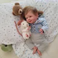 Realistic 19-inch reborn baby doll in blue striped hoodie and grey pants on soft blanket - Blue Striped Hoodie and Gray Pants Set Sebastian / 48cm