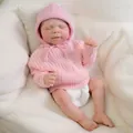 Realistic 19-inch reborn baby doll in pink knitted sweater and hat sleeping peacefully - Full Vinyl Closed Eyes / Pink