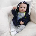 Realistic 19 inch LouLou reborn baby doll wearing a blue shark hoodie and monster outfit - Monster Three-Piece Style (2110)