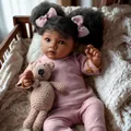 22-inch African reborn baby doll in pink waffle set with small brown knit bear toy - African American Doll / Pink