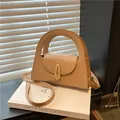 Beige semi-circle handbag with gold geometric buckle and adjustable leather shoulder strap - Khaki