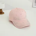 Detail of pink baseball cap with sparkling rhinestones and star-shaped crystal decor - One Size / Pink