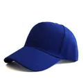Detail of royal blue baseball cap with curved brim and premium stitching textures - Adjustable / Sapphire Blue