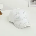 Detail of white baseball cap showing sparkling rhinestone Love letter patterns - One Size / White