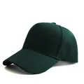 Close-up of a dark green five-panel baseball cap with reinforced stitching and twill fabric - Adjustable / Dark Green