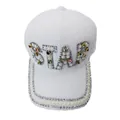 Macro view of STAR letter with colorful gemstones and pearls on white baseball cap - STAR Letter Style / White