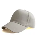 Detail view of the stitching and cotton twill texture on this beige five-panel baseball cap - Adjustable / Beige