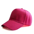 Close-up detail of rose pink 5-panel baseball cap with reinforced stitching and twill fabric - Adjustable / Rose Red